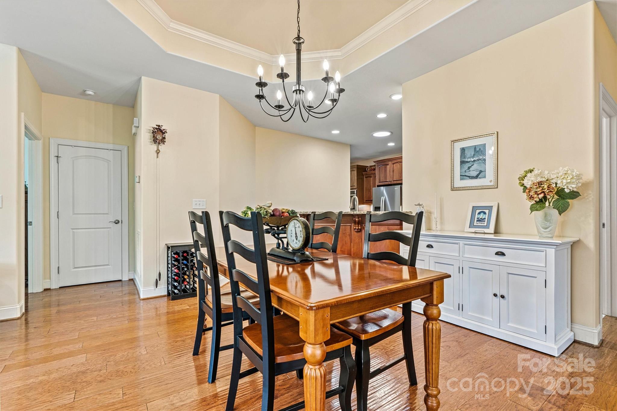 2369 Stardust Court Denver, NC 28037 - Photo 18 of 42 a view of a dining room with furniture and chandelier