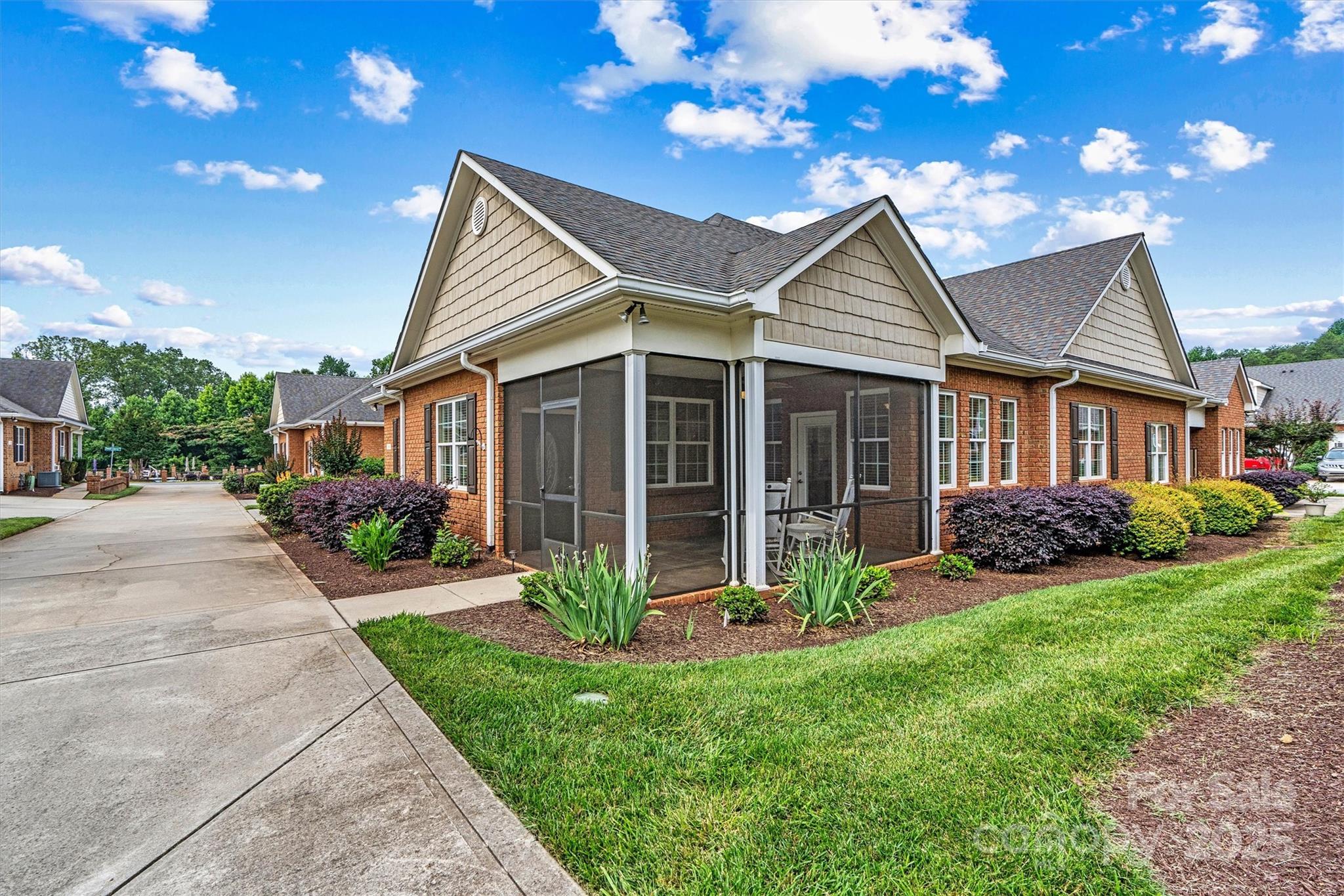 2369 Stardust Court Denver, NC 28037 - Photo 2 of 42 a view of a house with a yard and potted plants