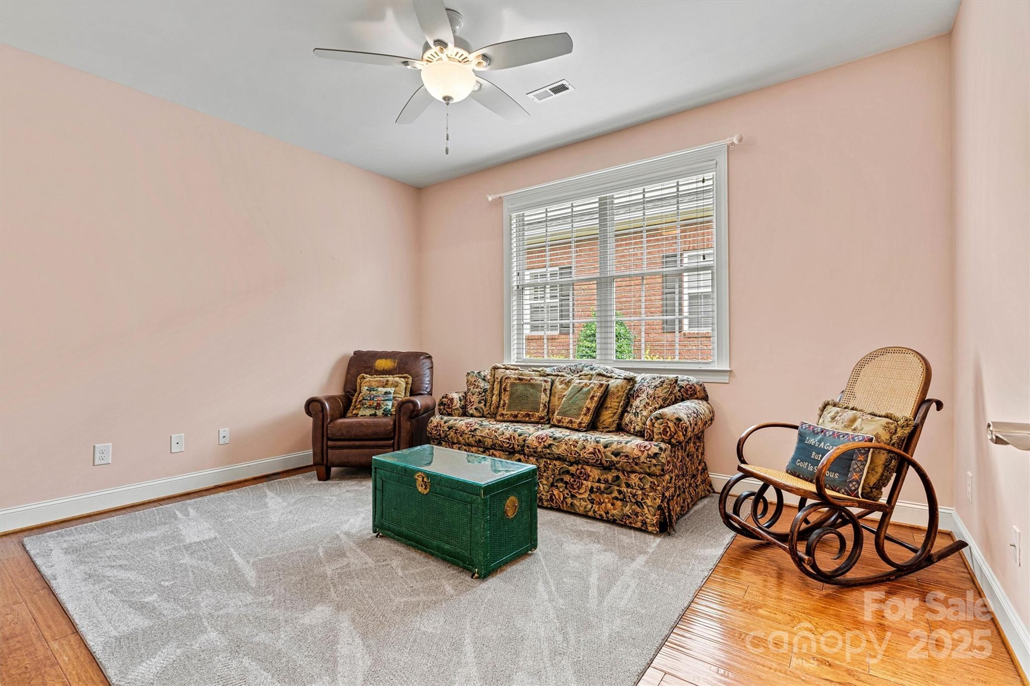 2369 Stardust Court Denver, NC 28037 - Photo 31 of 42 a living room with furniture and a window