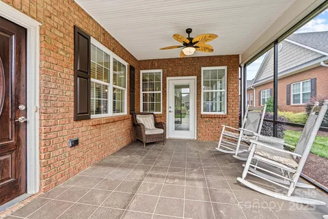 a view of an chairs in the balcony