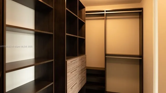 a bathroom with a toilet and a sink