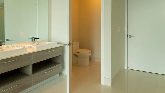 a view of an ocean and city