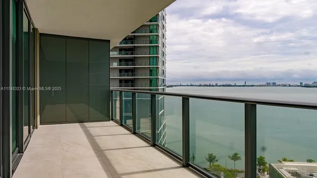 a kitchen with a table and chairs