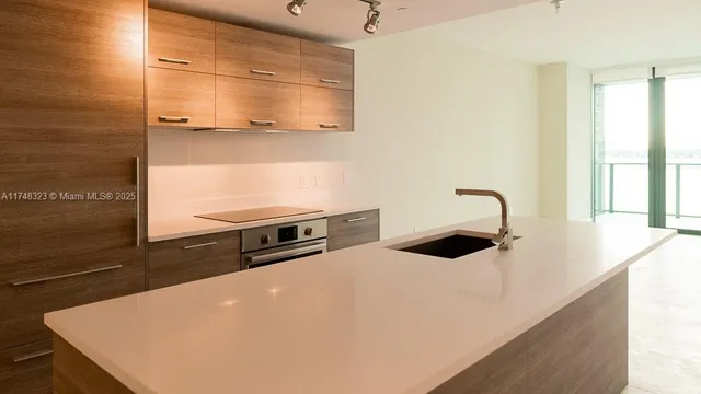 a view of a room with natural light