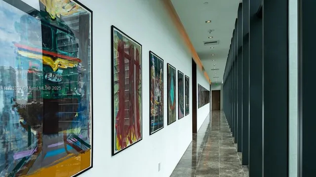 a view of a living room with furniture and a window