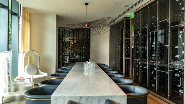 a balcony with furniture and a lamp