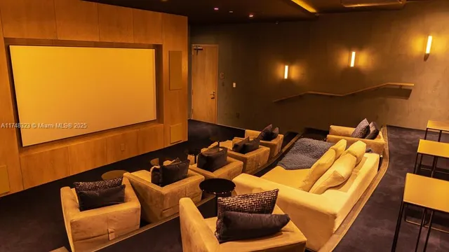 a living room with couch chairs and a table