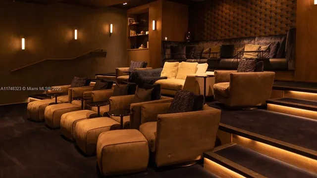 swimming pool view with two chairs