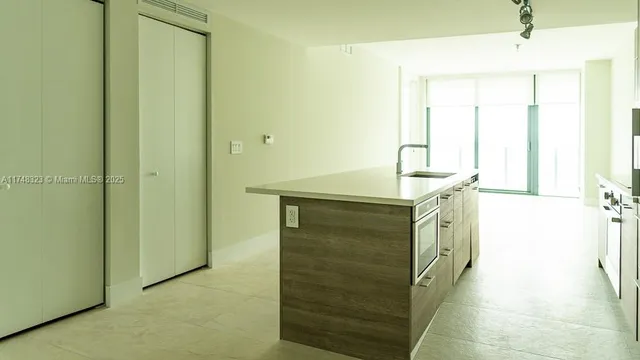 a view of a room that has a window