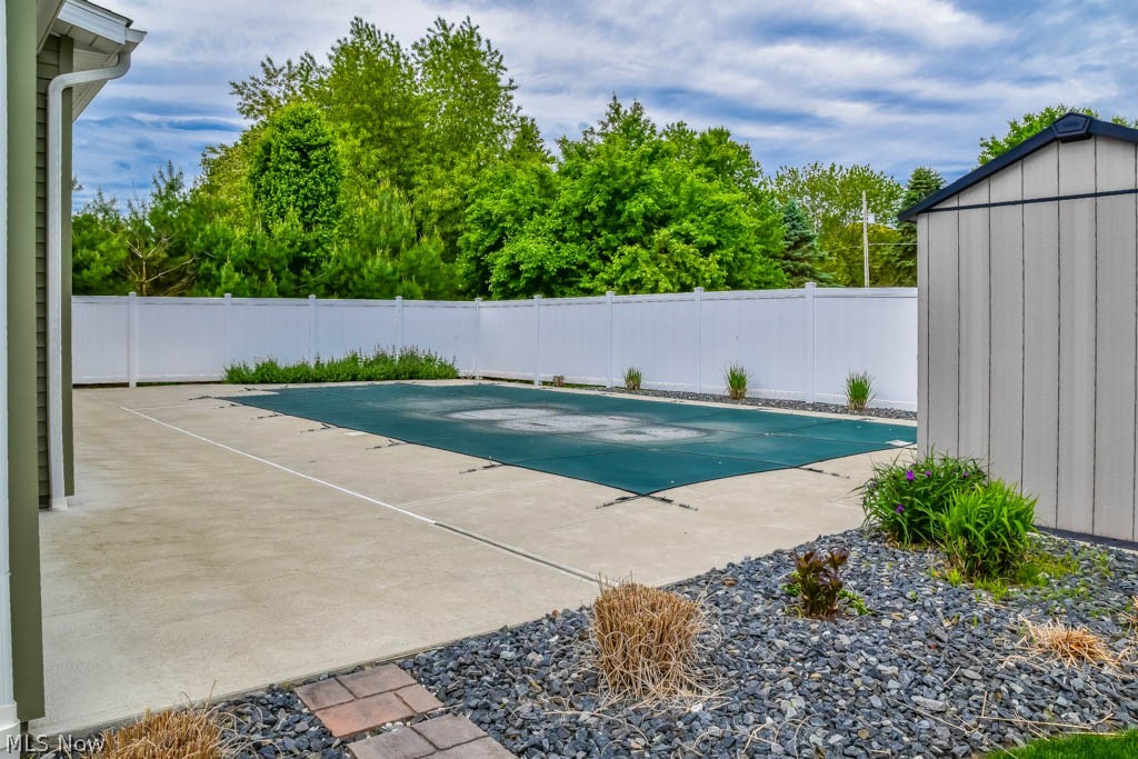 5785 Birmingham Road Northeast Canton, OH 44721 - Photo 19 of 21 Fully fenced backyard with an inground pool.