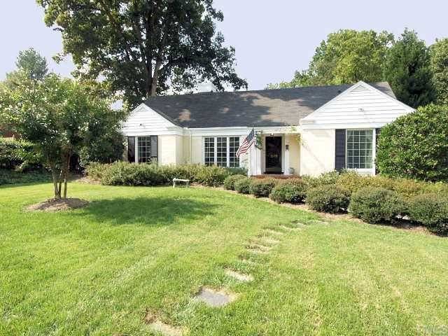 ADORABLE BRICK RANCH IN FANTASTIC LOCATION SITUATED ON ONE OF THE MOST BEAUTIFUL LOTS INSIDE THE BELTLINE! THIS IS YOUR CHANCE TO RENOVATE OR REBUILD AT THIS PRESTIGOUS WAKE DRIVE ADDRESS! Exterior Front