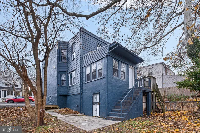 a front view of a house with a pathway