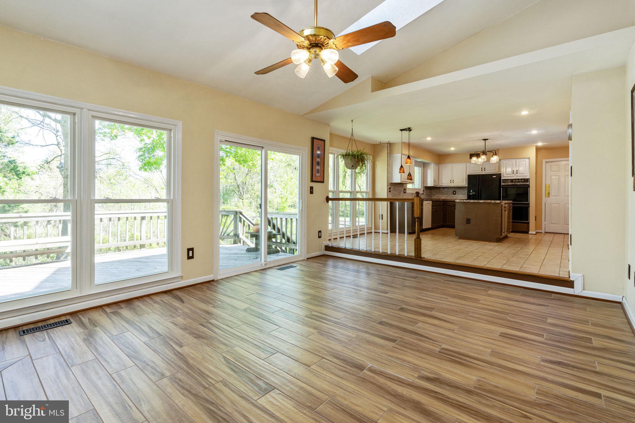 8029 Rocky Run Road Gainesville, VA 20155 - Photo 12 of 30 Living Area connecting to Kitchen