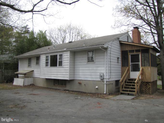 15411 Bond Mill Road Laurel, MD 20707 - Photo 18 of 26 a view of a house with a yard and large tree