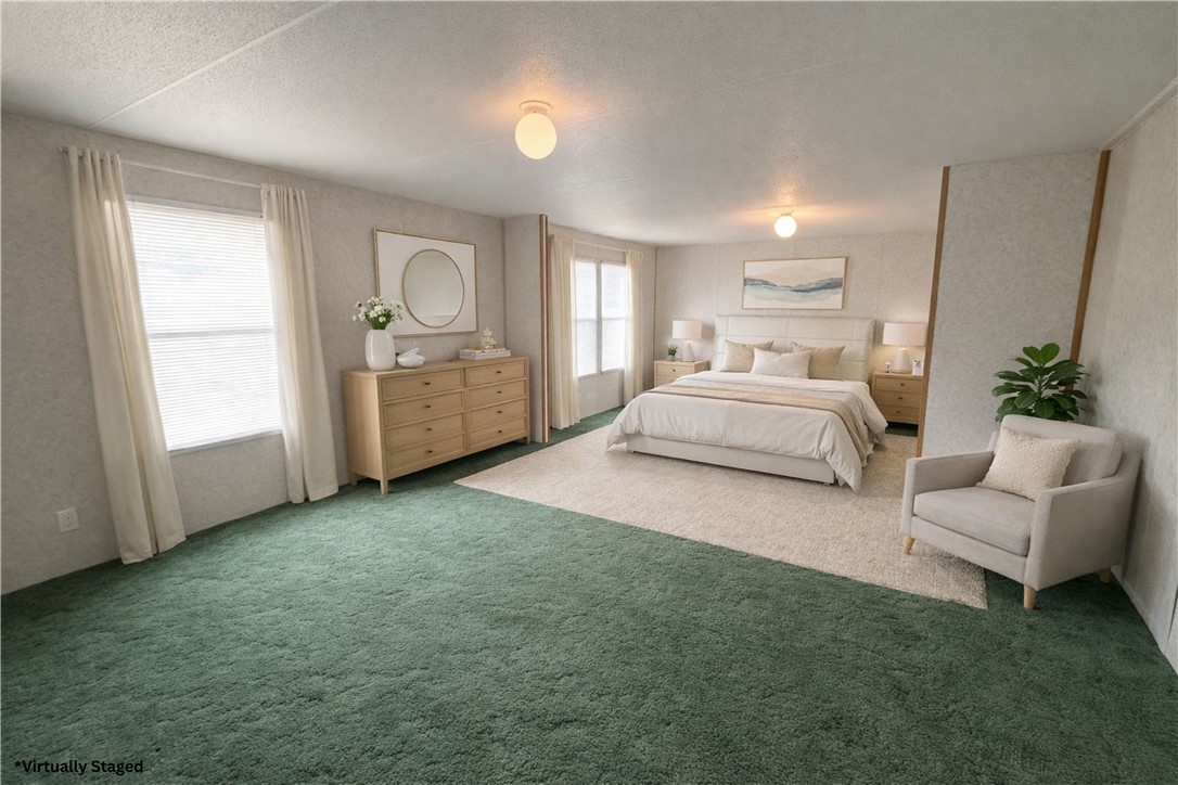 201 Reidville Road Williamston, SC 29697 - Photo 13 of 20 This spacious bedroom offers comfortable living with ample natural light.