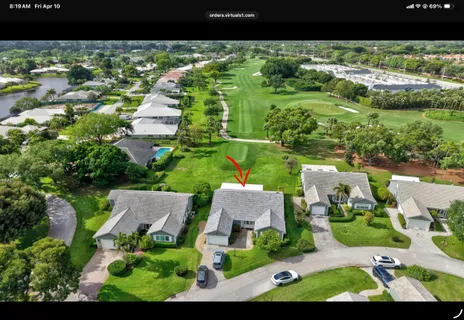 a house view with a garden space