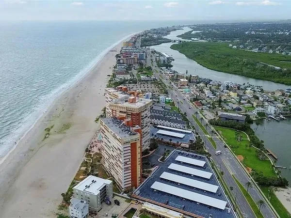 a view of a balcony with wooden floor