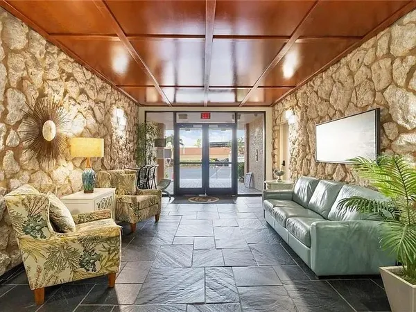 a front view of a building with outdoor area