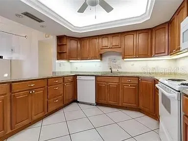 a living room with furniture a dining table and chairs