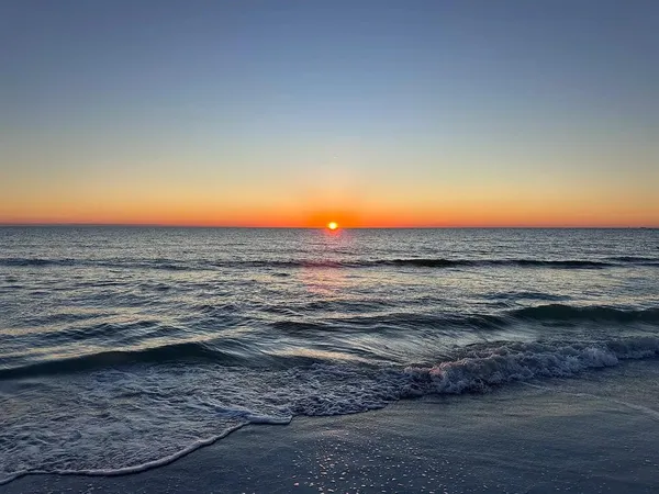 a front view of a building with street view