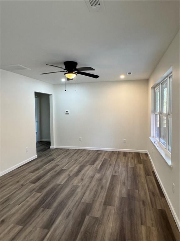 5120 South Dixie Highway Resaca, GA 30735 - Photo 4 of 14 a view of an empty room with wooden floor and a window