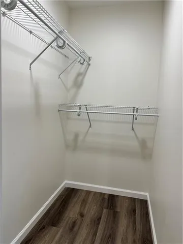 a view of a room with racks on the wall