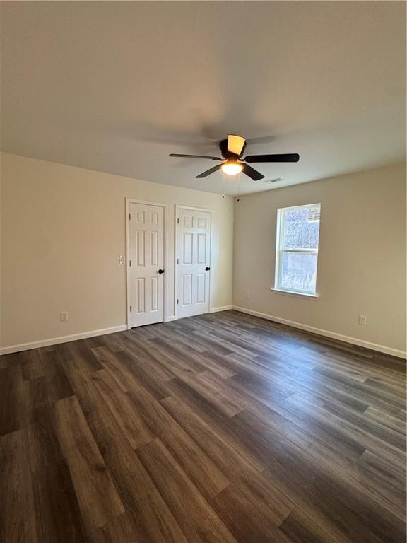 5120 South Dixie Highway Resaca, GA 30735 - Photo 9 of 14 an empty room with wooden floor and windows