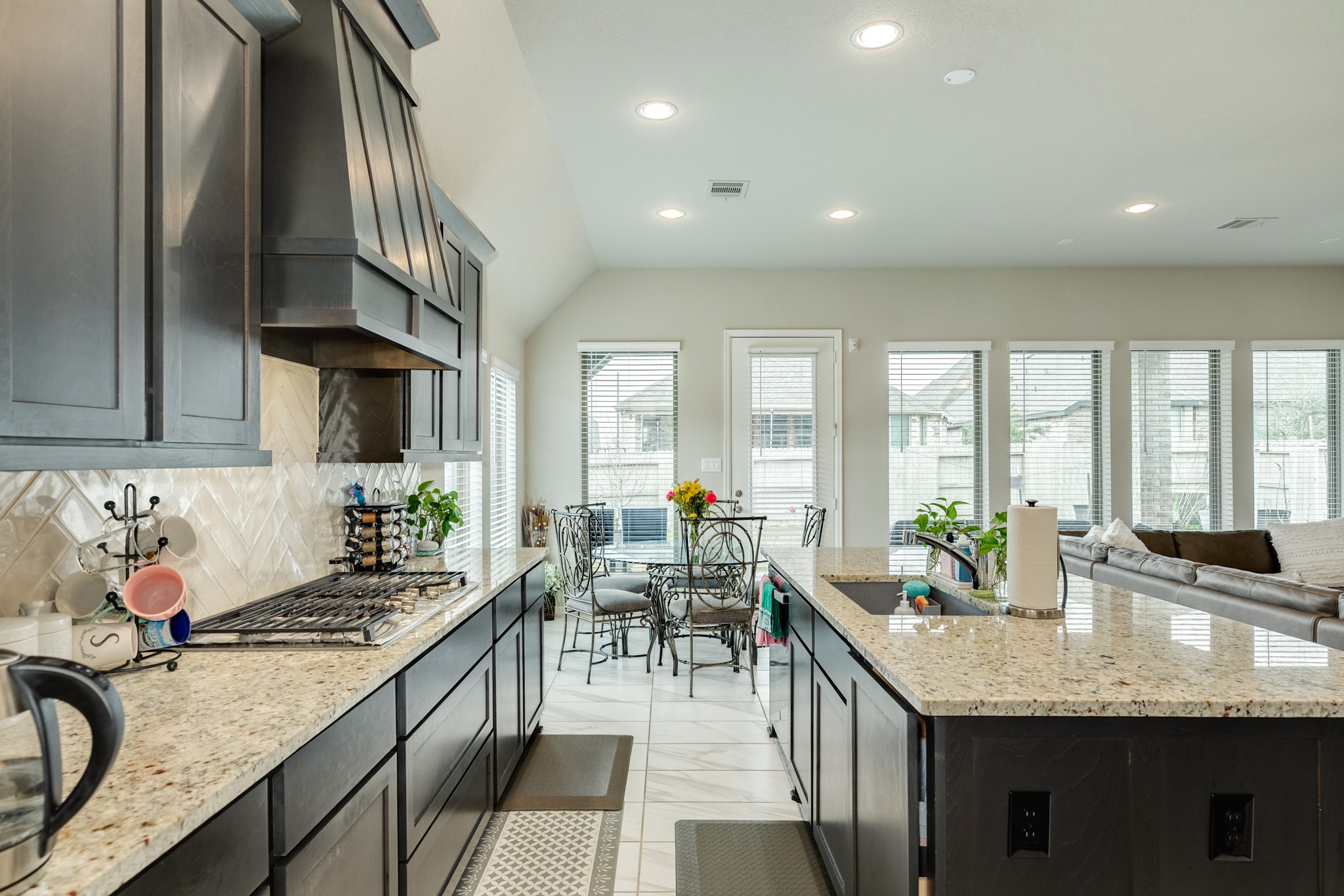 5138 Walnut Grv Lane Manvel, TX 77578 - Photo 15 of 43 a kitchen with granite countertop a sink and stove