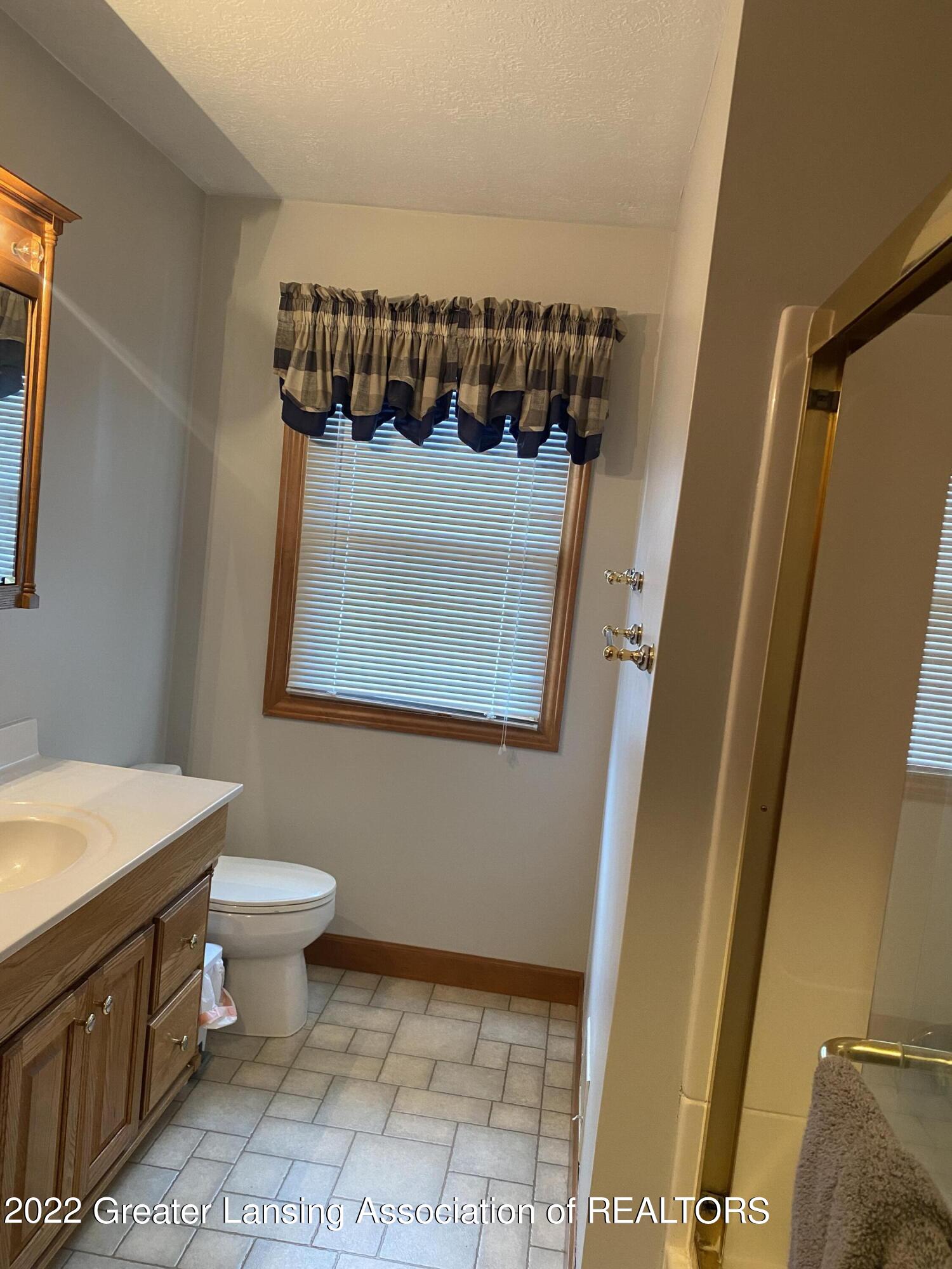 9136 Coleman Road Haslett, MI 48840 - Photo 19 of 34 1st Floor Full Bath