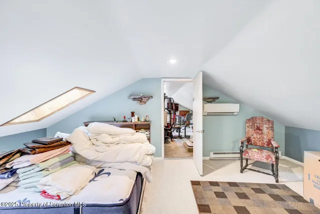 a kitchen with stainless steel appliances granite countertop a refrigerator and a stove