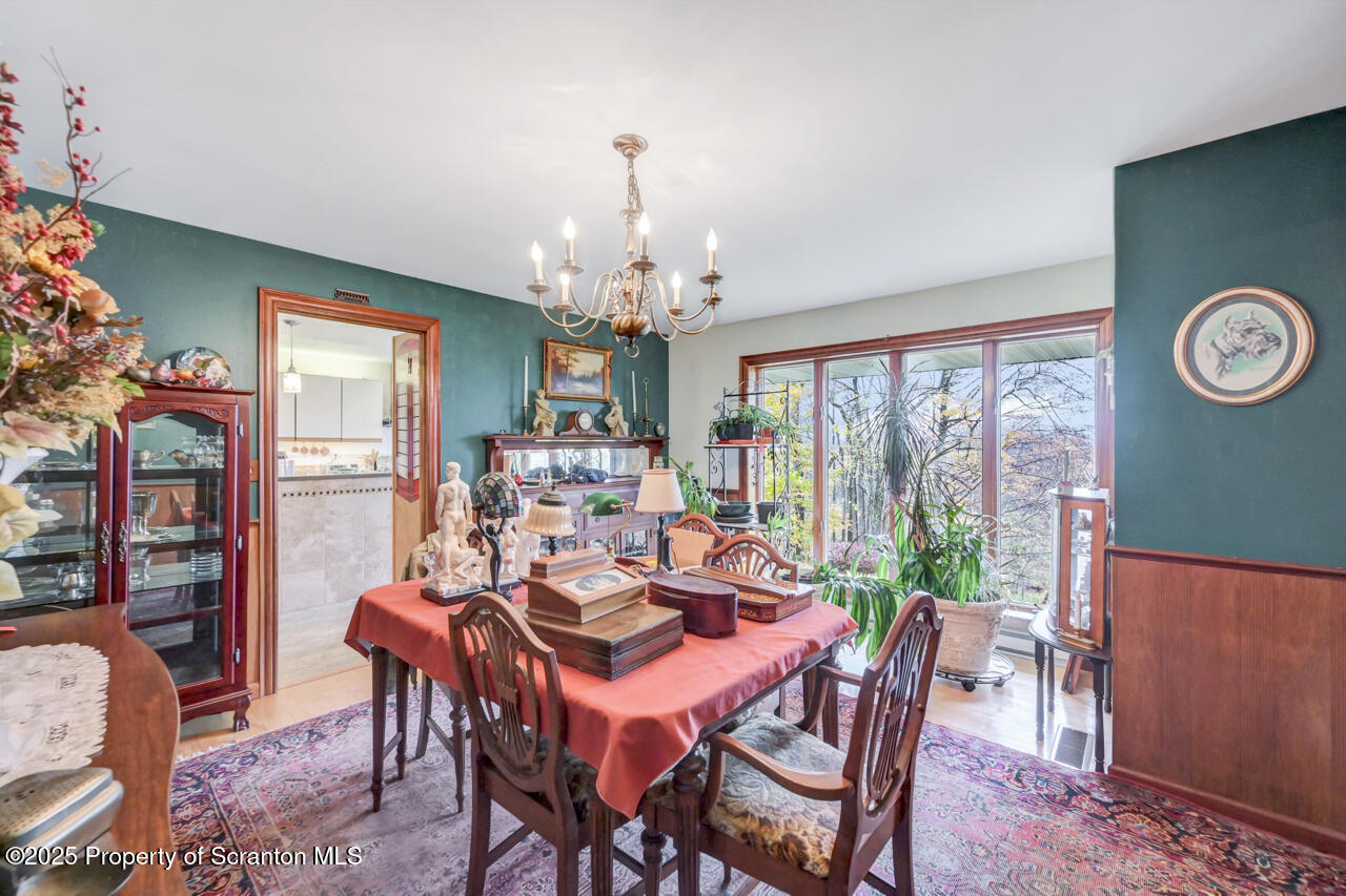 11 Mizianty Lane Waymart, PA 18472 - Photo 69 of 84 a view of a dining room with furniture window and outside view