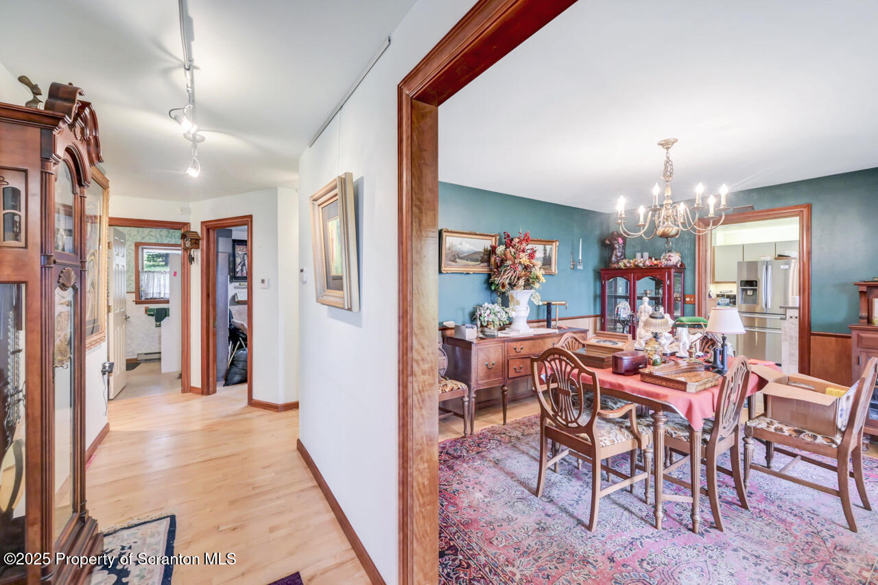 11 Mizianty Lane Waymart, PA 18472 - Photo 71 of 84 a view of a dining room with furniture and chandelier