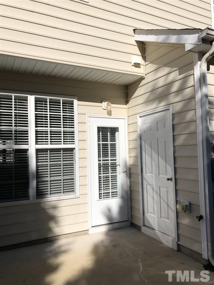 7857 Spungold Street Raleigh, NC 27617 - Photo 13 of 13 a view of empty room with windows