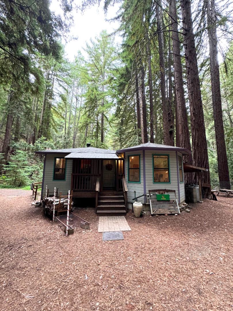 700 Laurel View Road Los Gatos, CA 95033 - Photo 1 of 21 a front view of a house with garden
