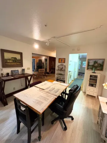 a view of a dining room with furniture
