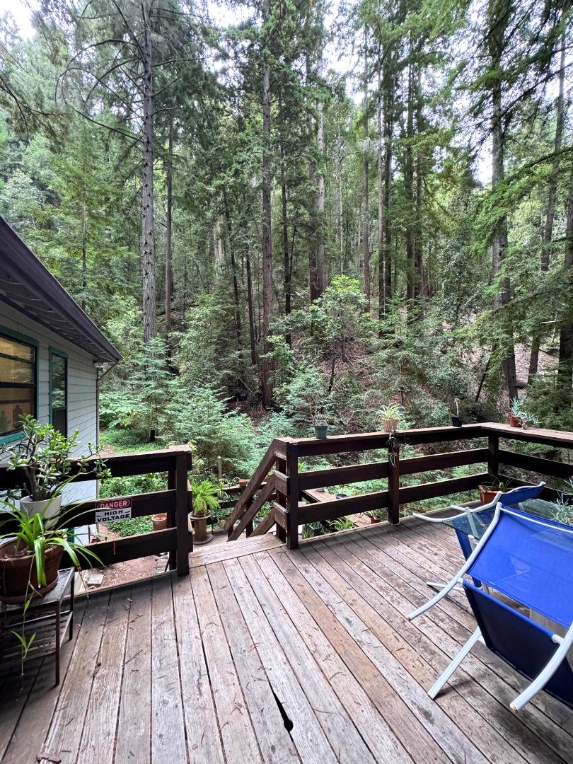 700 Laurel View Road Los Gatos, CA 95033 - Photo 4 of 21 a sitting area with wooden bench and trees