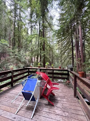 a view of outdoor sitting area with furniture