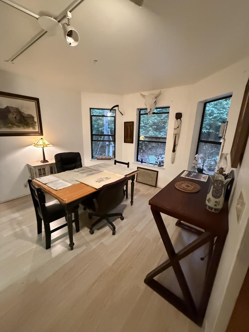 700 Laurel View Road Los Gatos, CA 95033 - Photo 9 of 21 a living room with furniture a flat screen tv and a table