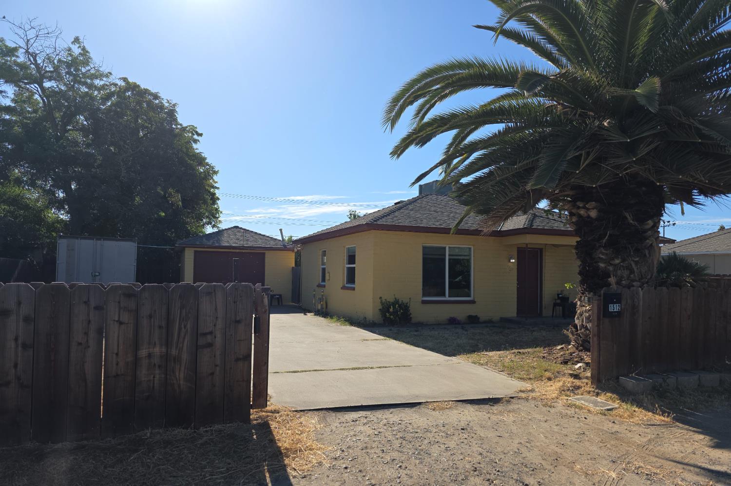 1512 Swalls Lane Modesto, CA 95358 - Photo 17 of 18 a view of a house with a yard