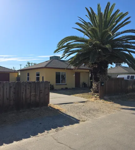 a view of a house with a patio