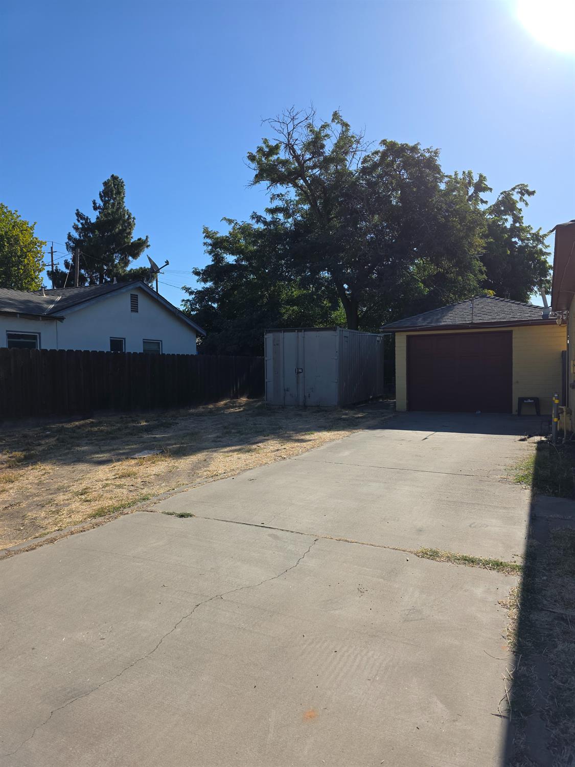 1512 Swalls Lane Modesto, CA 95358 - Photo 4 of 18 a front view of a house with a yard