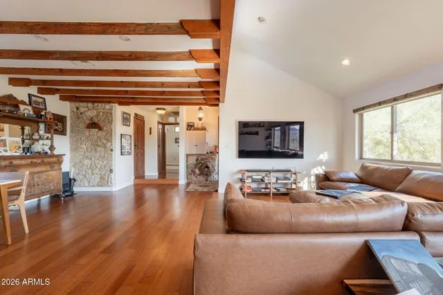 a living room with furniture and a window