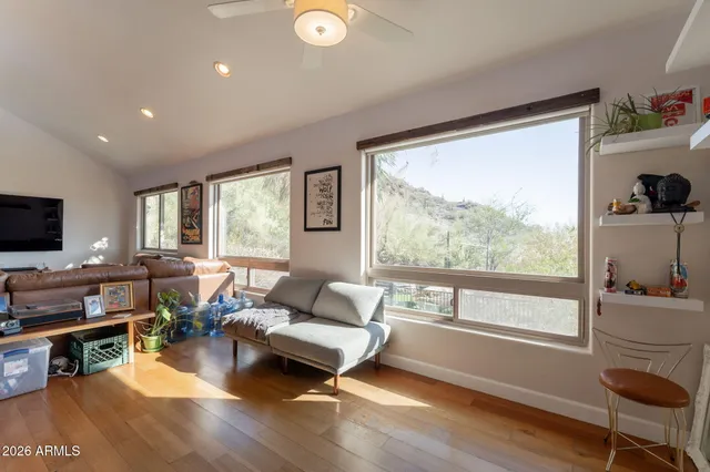 a kitchen with a sink cabinets and window