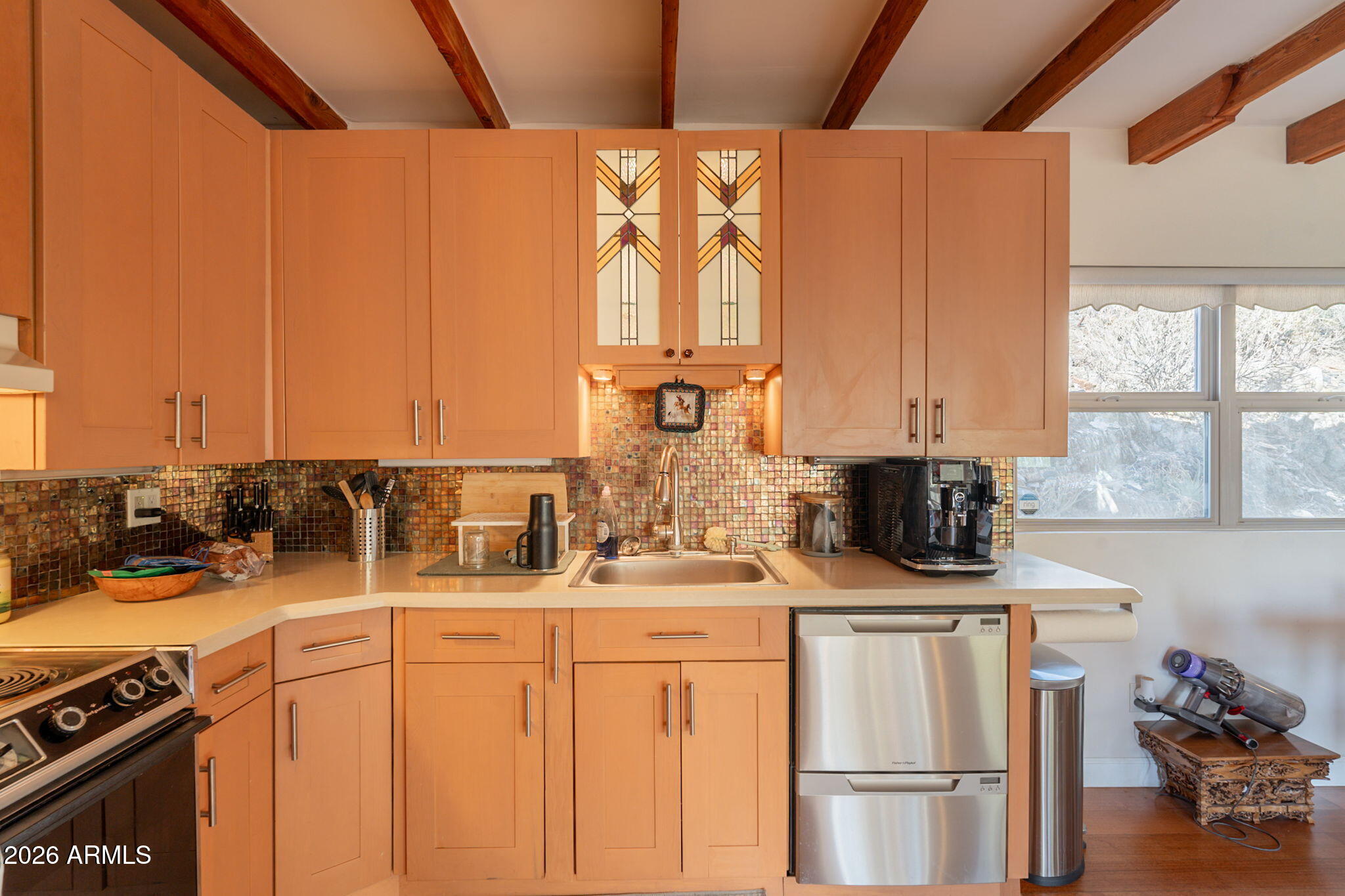 1902 East Cortez Street Phoenix, AZ 85020 - Photo 29 of 60 a kitchen with a sink cabinets and window