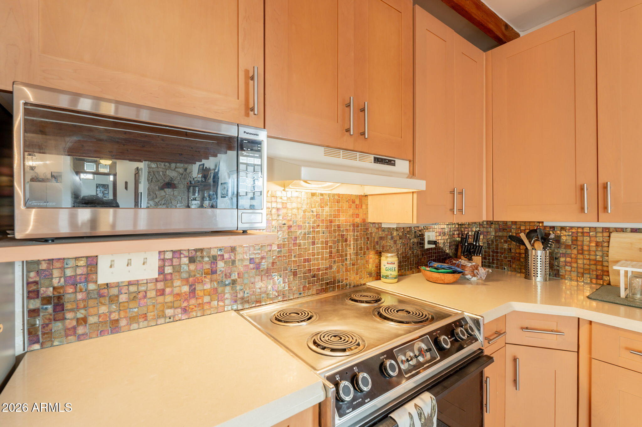1902 East Cortez Street Phoenix, AZ 85020 - Photo 30 of 60 a kitchen with a stove a sink and a cabinets