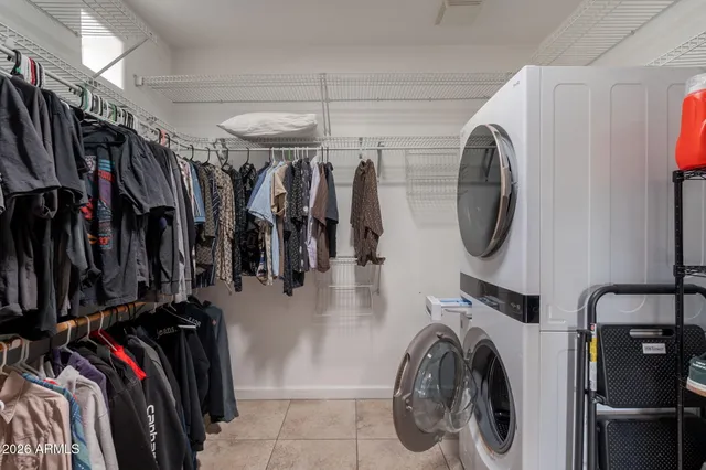 a bathroom with a bathtub sink and mirror
