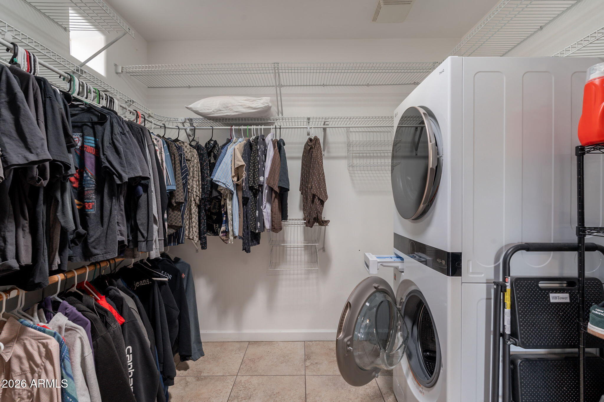1902 East Cortez Street Phoenix, AZ 85020 - Photo 37 of 60 a view of walk in closet with clothes and shoes