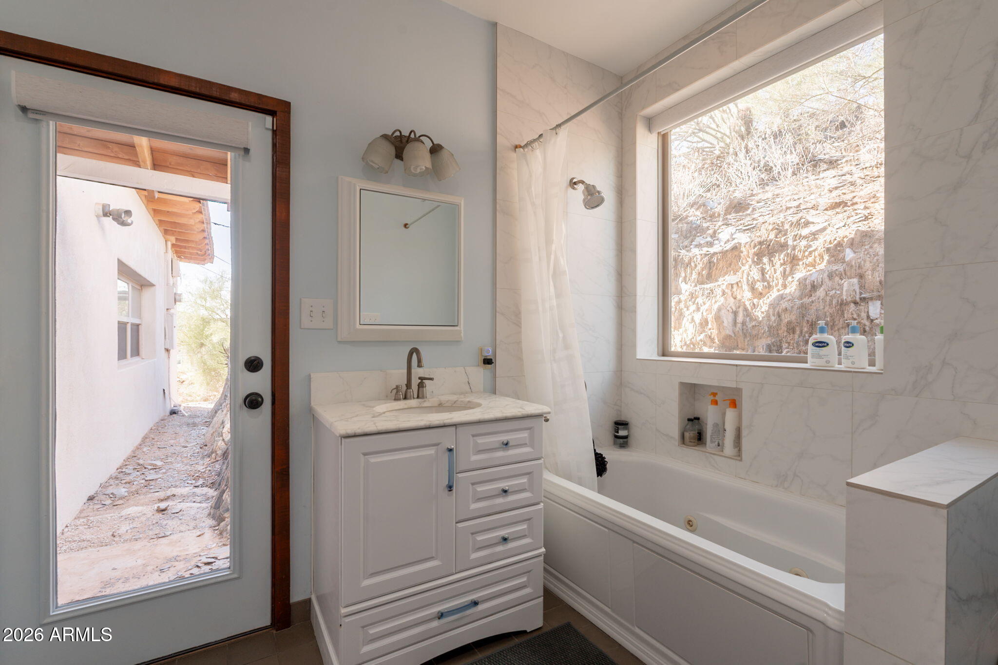 1902 East Cortez Street Phoenix, AZ 85020 - Photo 39 of 60 a bathroom with a granite countertop sink a toilet and a bathtub