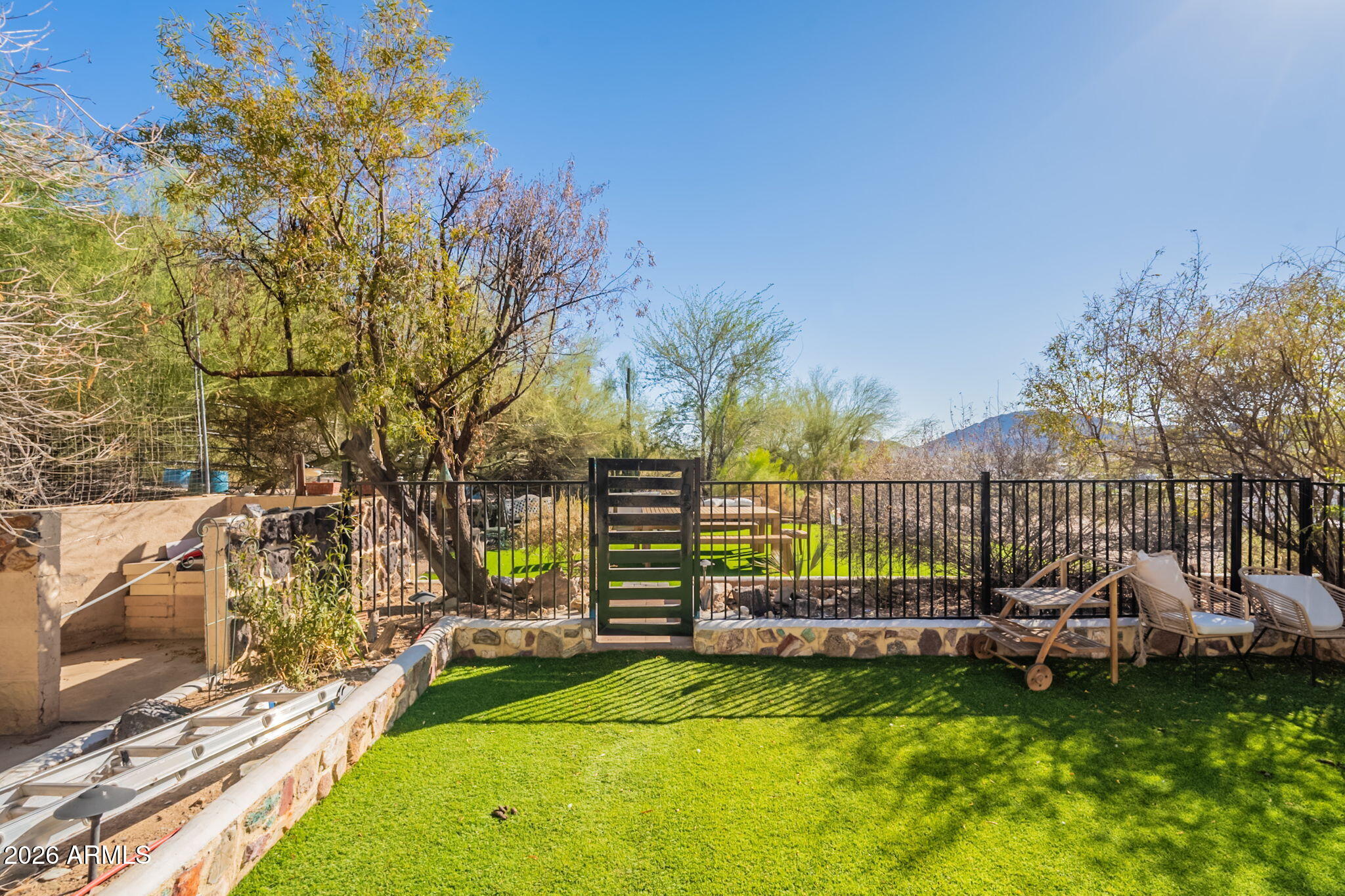 1902 East Cortez Street Phoenix, AZ 85020 - Photo 10 of 60 a view of a garden with wooden fence