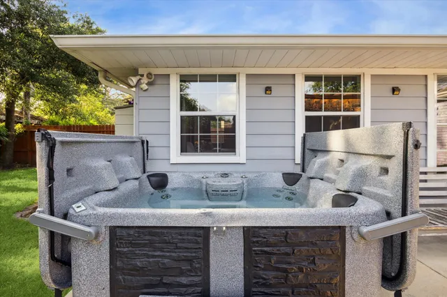 a front view of a house with seating space